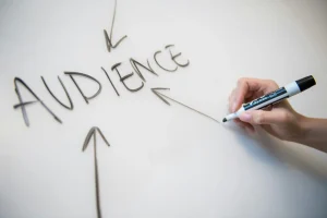 person-writing-on-white-paper-scaled